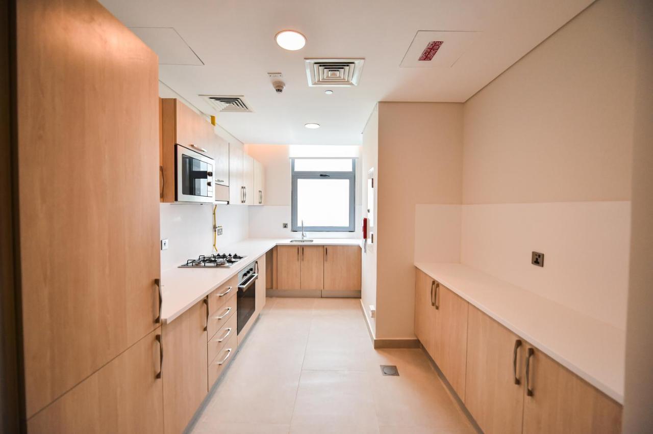 Waterfront Hotel Apartment Lusail Экстерьер фото A typical kitchen in a student flat