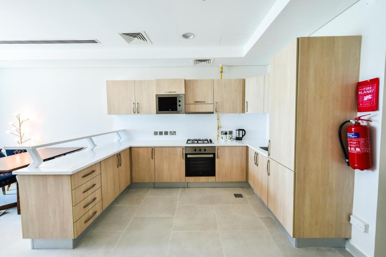 Waterfront Hotel Apartment Lusail Экстерьер фото A typical kitchen in a student residence hall