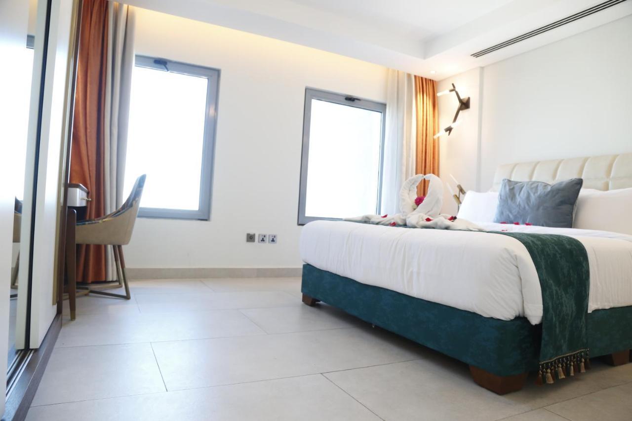 Waterfront Hotel Apartment Lusail Экстерьер фото A room at the hotel