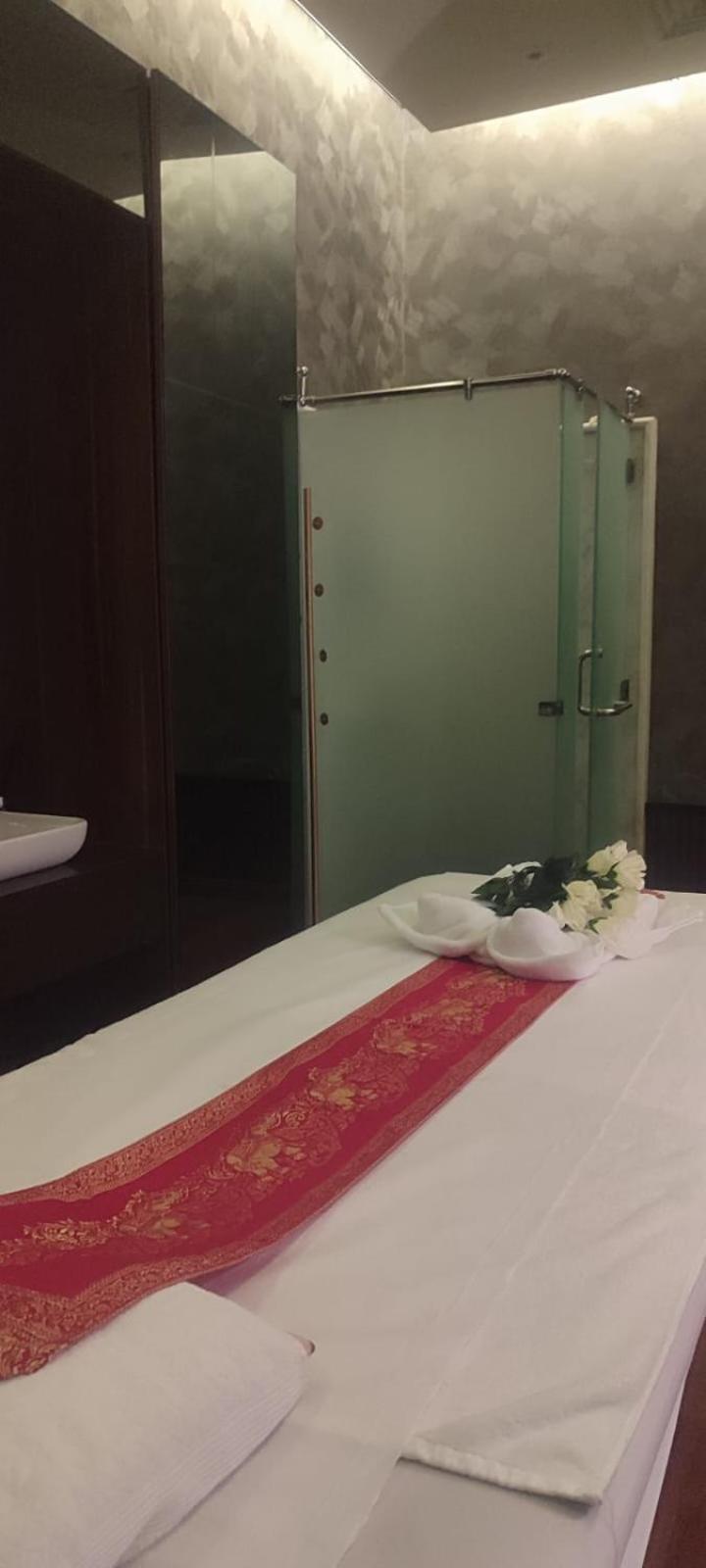 Waterfront Hotel Apartment Lusail Экстерьер фото A shower cubicle in a Thai spa